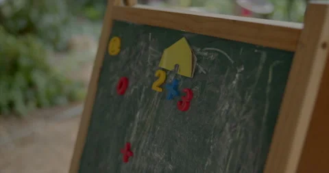 2+3 arithmetic exercise on a wooden toy board Stock Footage 314136143