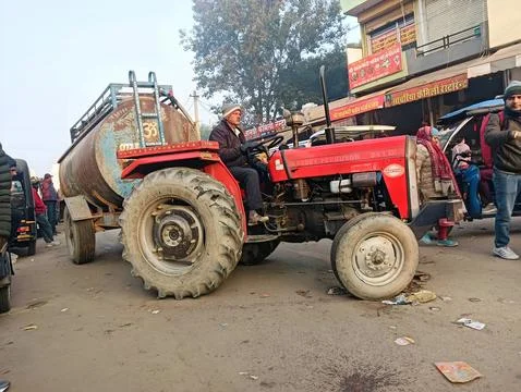 23 December 2024 reengus Rajasthan India , Water supply tractor with tanker Stock Photos