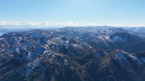23 Second Smooth Aerial Pullback From Snowy Mountain Landscape Stock Footage 342846686