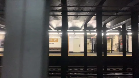 23 street subway stop - leaving station - moving train view NYC Stock Footage