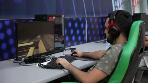 2/3 Young man plays computer battle games Stock Footage 216775201