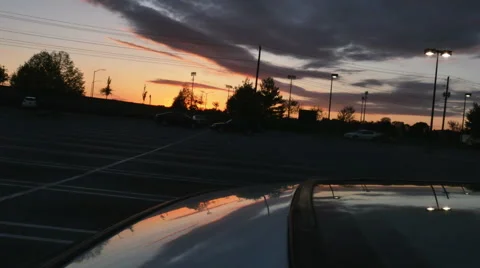 2301 Sunset with Reflection off of Car Window, HD Stock Footage 42687665
