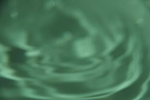 232.An abstract background of undefined shapes with various shades and wave.. Stock Photos