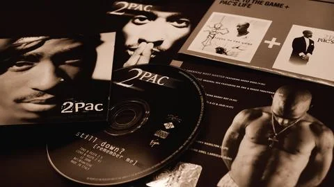 Rome, August 16, 2019: Covers of CDs by Tupac Shakur. also known as 2Pac and Makaveli, her double album, All Eyez on Me, released in 1996 became one of the best-selling albums in the United States xkwx actor, arts, celebrities, celebrity, city, concert, creative, culture, entertainment, event, fame, famous, fashion, gangsta rap, glamour, hip hop, hiphop, hollywood, live, music, nightclub, old school, outlaws, outlawz, paramount pictures, people, person, popular, premiere, rap, star, street, style, success, successful, talent, trendy, tupac, tupac shakur, urban, well-known, cd