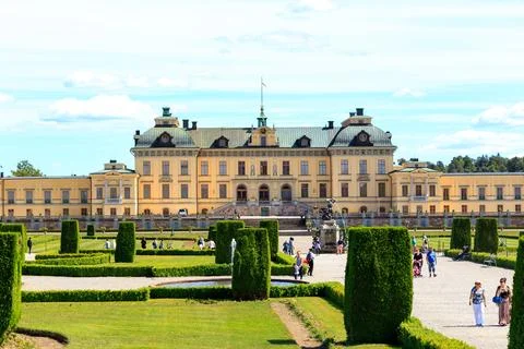Stockholm, Sweden - June 23, 2019: Palace Garden and Drottningholm Palace xkwx palace,sweden,tourism,garden,landmark,park,building,stockholm,drottningholm,architecture,travel,scandinavia,historic,royal,attraction,sky,drottningholm palace,swedish,old,heritage,summer,castle,residence,style,culture,facade,baroque,outdoor,statue,tourist,europe,famous,blue,green,sculpture,family,nordic,unesco,king,history,scenery,house,drottningholms slott,lawn,wealth,historical,tree,seat,luxury