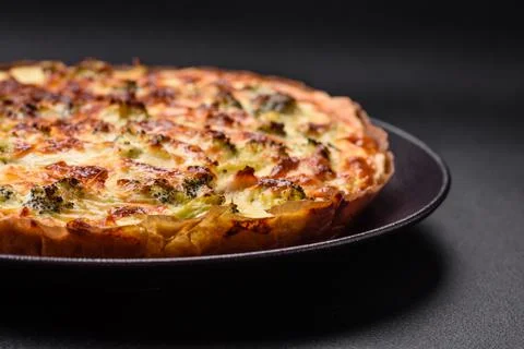 Delicious  quiche  with  broccoli,  cheese,  chicken,  spices  and  herbs  on  a  dark  concrete  background xkwx broccoli,  quiche,  food,  cheese,  vegetable,  meal,  pie,  dinner,  crust,  lunch,  pastry,  dish,  egg,  green,  baked,  cuisine,  tart,  snack,  homemade,  gourmet,  french,  healthy,  kitchen,  eating,  delicious,  breakfast,  cooking,  cake,  fish,  cream,  table,  recipe,  traditional,  salmon,  dough,  vegetarian,  lorraine,  background,  rustic,  ingredient,  spinach,  tasty,  cooked,  appetizer,  gratin,  wood,  organic