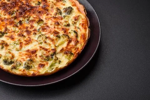 Delicious  quiche  with  broccoli,  cheese,  chicken,  spices  and  herbs  on  a  dark  concrete  background xkwx broccoli,  quiche,  food,  cheese,  vegetable,  meal,  pie,  dinner,  crust,  lunch,  pastry,  dish,  egg,  green,  baked,  cuisine,  tart,  snack,  homemade,  gourmet,  french,  healthy,  kitchen,  eating,  delicious,  breakfast,  cooking,  cake,  fish,  cream,  table,  recipe,  traditional,  salmon,  dough,  vegetarian,  lorraine,  background,  rustic,  ingredient,  spinach,  tasty,  cooked,  appetizer,  gratin,  wood,  organic