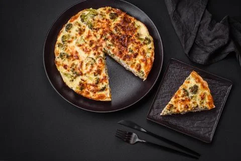 Delicious  quiche  with  broccoli,  cheese,  chicken,  spices  and  herbs  on  a  dark  concrete  background xkwx broccoli,  quiche,  food,  cheese,  vegetable,  meal,  pie,  dinner,  crust,  lunch,  pastry,  dish,  egg,  green,  baked,  cuisine,  tart,  snack,  homemade,  gourmet,  french,  healthy,  kitchen,  eating,  delicious,  breakfast,  cooking,  cake,  fish,  cream,  table,  recipe,  traditional,  salmon,  dough,  vegetarian,  lorraine,  background,  rustic,  ingredient,  spinach,  tasty,  cooked,  appetizer,  gratin,  wood,  organic