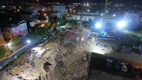 24-7 non stop muddy construction site at night time lapse Stock Footage 167194694