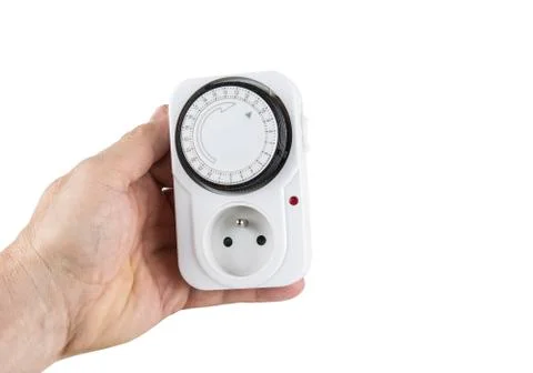 24 Hour Mains Plug In Timer Switch Time Clock european socket Stock Photos
