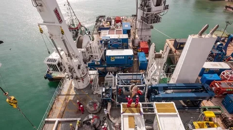 24 Hour Time-lapse of Cranes Loading and Unloading Ships Stock Footage 48135079