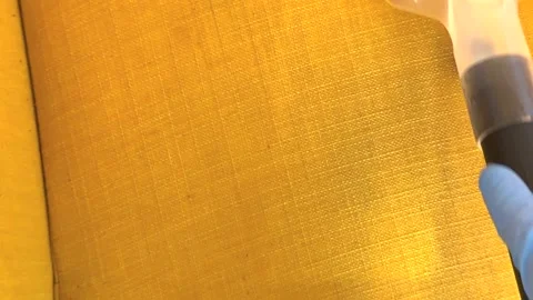 24/02/2026. Wroclaw. Poland hand using an extraction vacuum nozzle to clean Stock Footage 329774475