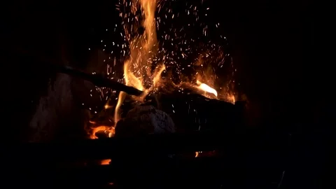 240fps slow motion fire, fireplace sparks flying FUJI XT4 Stock Footage