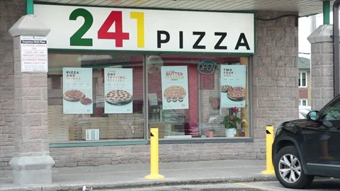 241 pizza restaurant store storefront pizzeria entrance with rectangle sign logo Stock Footage 250281395