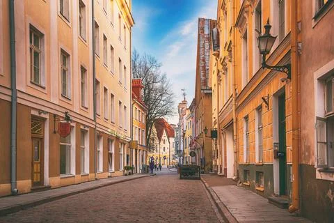 Street in old town. Tallinn, Estonia. Travel nordic concept xkwx tallinn old town estonia street architecture europe city building baltic urban house european tourism travel stone capital medieval view traditional outdoor culture history ancient road yellow cobblestone wall tranquil tourist estonian sightseeing sky beautiful heritage touristic