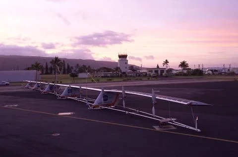 The 247-foot length of the Helios prototype wing is in evidence as the hig... Stock Photos