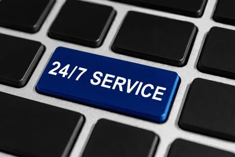 24/7 service button on keyboard Stock Photos