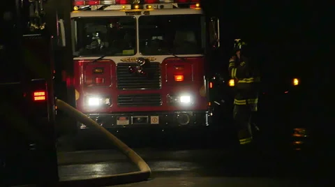 2470 FIre Engine Vehicles with Flashing Lights and Fire Men at House Fire, 4K Stock Footage 43675435