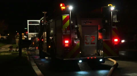 2474 FIre Engine Vehicles with Flashing Lights and Fire Men at House Fire, 4K Stock Footage 43675758