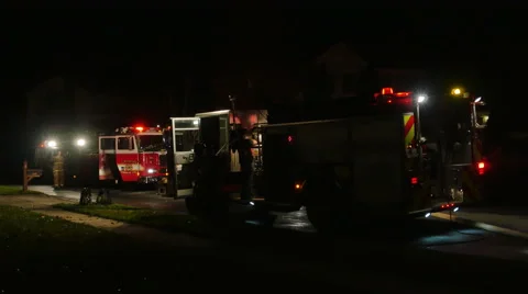 2478 FIre Engine Vehicles with Flashing Lights and Fire Men at House Fire, 4K Stock Footage 43676070