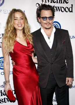 Amber Heard and Johnny Depp at the Art Of Elysium's 9th Annual Heaven Gala held at the 3LABS in Culver City, USA on January 9, 2016. xkwx actor actress celebrity talent actors actresses entertainment cinema red carpet premiere movie star celebrities fashion hollywood famous fame popular movies film success dress artist california event attractive
