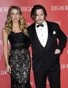 Amber Heard and Johnny Depp at the 27th Annual Palm Springs International Film Festival Awards Gala held at the Palm Springs Convention Center in Palm Springs, USA on January 2, 2016. xkwx actor actress celebrity talent actors actresses entertainment cinema red carpet premiere movie star celebrities fashion hollywood famous fame popular movies film success dress artist california event attractive