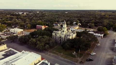 24fps Slow orbit Goliad County courthouse November 1st 2024 color graded Video stock 292025404