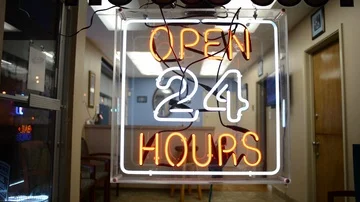 24hr Neon Sign - Static with Flashes in Background Stock Footage