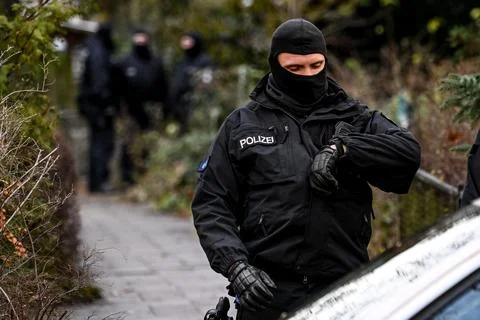25 arrested on suspicion of plotting to overthrow government in police raids acr Stock-Fotos