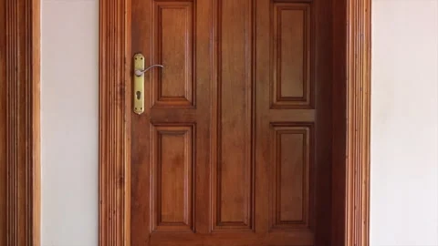 25 year old front door made with teak wood. Teak wood furniture. Stock Footage 279631373