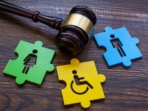 Gavel with puzzle pieces. Disabled person sign as a symbol of inclusion. xkwx inclusion equality rights law social diversity discrimination disability integration concept tolerance disabled inequality problem difficulty employment opportunity unfair employee community inclusive unity equity individuality opportunities fairness