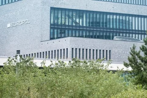 building European Union Agency for Law Enforcement Cooperation with Europol text on facade, EU institutions, counterterrorism intelligence sharing xkwx Europol police European justice organization crime building counterterrorism EU Agency Criminal European Union law enforcement security prevention international cooperation policing intelligence sharing enforcement facade architecture exterior enforcement agency criminal justice European Union security crime control cross-border partnership Europol building global headquarters crime analysis logo