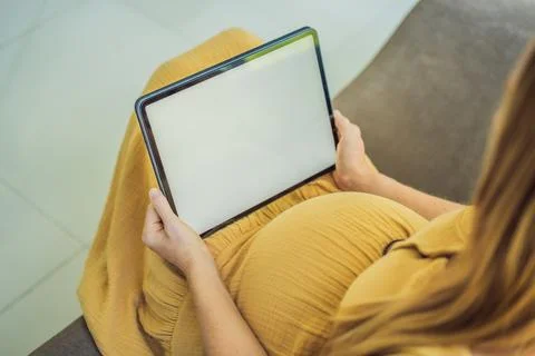 Mobile pregnancy online maternity application. Pregnant mother using phone. Pregnancy, medicine, pharmaceutics, health care and people concept. xkwx pregnant online pregnancy mother application woman app young technology maternity mobile cellphone phone internet beautiful belly expecting expectant home smartphone person abdomen connection motherhood communication anticipation sitting tummy concept prenatal smiling information concepts advertisement programm template photography preparation expectation morning expectance list computer copy space care awaiting happy