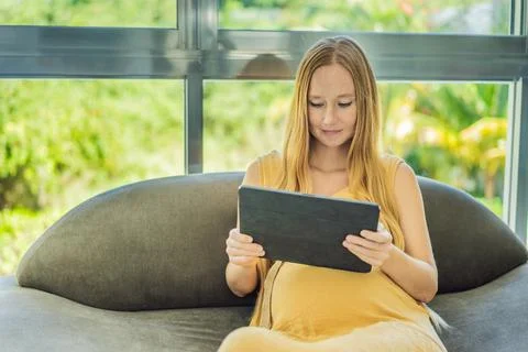Mobile pregnancy online maternity application. Pregnant mother using phone. Pregnancy, medicine, pharmaceutics, health care and people concept. xkwx pregnant online pregnancy mother application woman app young technology maternity mobile cellphone phone internet beautiful belly expecting expectant home smartphone person abdomen connection motherhood communication anticipation sitting parent telephone care screen copy space lifestyle cheerful prenatal morning free space parenthood template computer mockup bed concept holding african hand family