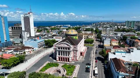 Panorama aerial view of Amazonas Theater at downtown city Manaus Brazil. Cityscape of tourism landmark city. Amazonas medieval building theater at downtown Manaus Brazil. xkwx Amazonas Theater Manaus Amazonas Brazil religion aerial view panorama sao sebastiao square buildings building museum theatre theater house castle metropolis riverside landscape metropole skyline church architecture view sky north region sustainable nature ecosystem landmark outdoors destinations vacations travel tourist tourism background day downtown city town urban district cityscape medieval street transportation up above