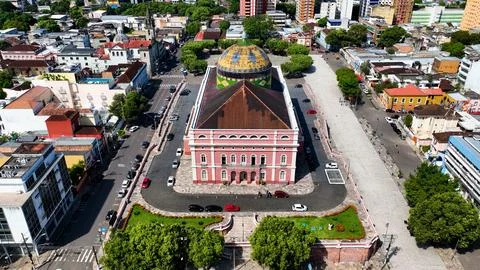 Cityscape of downtown Manaus north region of Brazil riverside Amazon river and Amazon jungle. Travel destinations. Tropical travel. Green sustainable tourism at Amazonian ecosystem. xkwx Historic Downtown Manaus Amazonas Brazil maritime north region sustainable nature ecosystem harbor amazon amazonia river amazonian skyline landmark outdoors destinations vacations travel tourist tourism background landscape aerial view sunny day downtown city town urban district cityscape building medieval square street pier shore boats transportation dock nautical vessel fluvial riverine theater market municipal up above