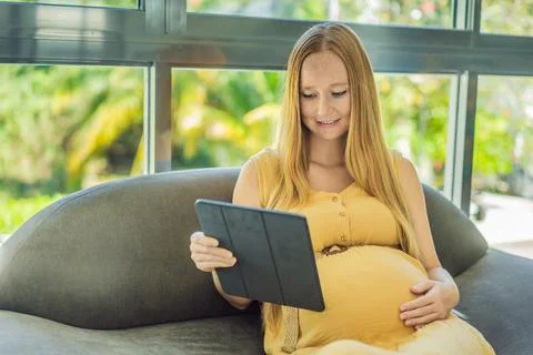 Mobile pregnancy online maternity application. Pregnant mother using phone. Pregnancy, medicine, pharmaceutics, health care and people concept. xkwx pregnant online pregnancy mother application woman app young technology maternity mobile cellphone phone internet beautiful belly expecting expectant home smartphone person abdomen connection motherhood communication anticipation sitting concept parenthood screen african list prenatal empty space holding showing lifestyle copy space happy family indoors bedroom tablet advertisement programm buy morning
