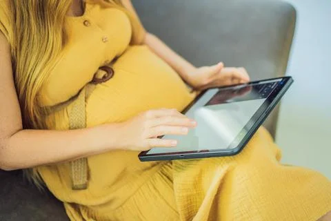Mobile pregnancy online maternity application. Pregnant mother using phone. Pregnancy, medicine, pharmaceutics, health care and people concept. xkwx pregnant online pregnancy mother application woman app young technology maternity mobile cellphone phone internet beautiful belly expecting expectant home smartphone person abdomen connection motherhood communication anticipation sitting programm maternal millennial concept morning blank preparation telephone parent indoors empty space information copy space cheerful list goods care happy photography template
