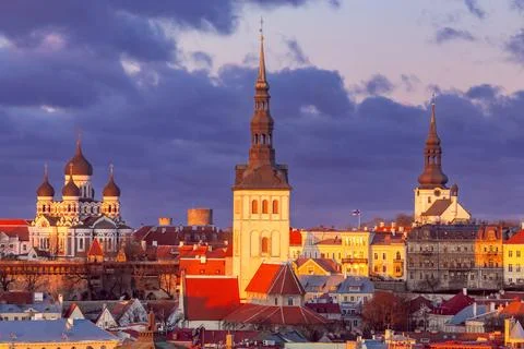 Scenic aerial view of the historic city center. Tallinn. Estonia. xkwx Tallinn Estonia Europe Baltika city towers architecture facades building domes medieval streets tourist attraction travel tourism square story dawn morning lanterns old roofs famous cityscape aerial view clouds