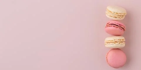 Macaroons on pink background, colorful french cookies pattern. Gift for 8 March, International Women's Day, Valentine Day. Horizontal banner with copyspace xkwx macaroon traditional macaron sweet cookie confectionery biscuit french colorful pastry macaroons snack chocolate tasty pastel cream background sugar assortment food dessert cake bakery closeup delicious pink candy color green white top yellow french macaroons falling pastel colored coffee delicate lemon overhead vanilla confection delicious macaroon macarons colourful pattern banner