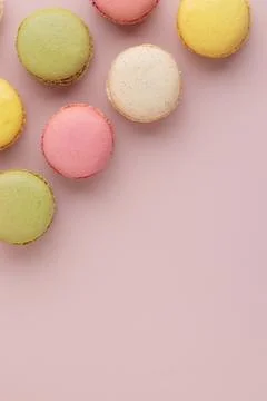 Macaroons on pink background, colorful french cookies pattern. Gift for 8 March, International Women's Day, Valentine Day. Vertical banner with copyspace xkwx macaroon traditional macaron sweet cookie confectionery biscuit french colorful pastry macaroons snack chocolate tasty pastel cream background sugar assortment food dessert cake bakery closeup delicious pink candy color green white top yellow french macaroons falling pastel colored coffee delicate lemon overhead vanilla confection delicious macaroon macarons colourful pattern banner