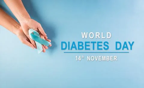 World diabetes day awareness concept. Hand holding blue ribbon, symbolic bow color raising awareness in diabetes day on pastel background, 14 November. xkwx analyzing awareness background blood care checking concept control day diabet diabetes diabetes concept diabetes test diabetic diagnosis disease drop finger glucometer glucose hand health health care healthcare healthy hospital hyperglycemia hypoglycemia illness instrument insulin insulin injection insulin pen level measure measurement medical medicine meter patient person prevention protection ribbon sample stick sugar test treatment world