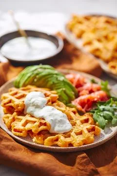 Hearty sweet potato or pumpkin waffles with avocado, salmon, arugula and sauce xkwx waffle salmon sweet potato pumpkin breakfast avocado healthy food delicious meal dinner lunch tasty fish morning dish snack homemade diet plate fresh green vegetable brunch cooking background gourmet salad smoked baked epicure bread toast sauce belgian healthy breakfast wafer fat eating organic fast food nourishment smoked salmon herb belgian waffles ketogenic arugula
