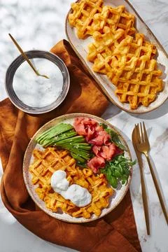 Hearty sweet potato or pumpkin waffles with avocado, salmon, arugula and sauce xkwx waffle salmon sweet potato pumpkin breakfast avocado healthy food delicious meal dinner lunch tasty fish morning dish snack homemade diet plate fresh green vegetable brunch cooking background gourmet salad smoked baked epicure bread toast sauce belgian healthy breakfast wafer fat eating organic fast food nourishment smoked salmon herb belgian waffles ketogenic arugula