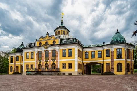 Weimar, Germany - May 12, 2023: Castle Belvedere near Weimar Thuringia Germany is a elegant summer residence dating from 18th century. View from the Castle park. xkwx weimar germany belvedere palace castle park schloss thuringia goethe schiller building architecture travel baroque landmark facade residence historical garden landscape yellow heritage history house old unesco culture panorama historic monument tourism chateau university pavillon orangery visit green orangerie europe experience destination countryside tree orange recreation