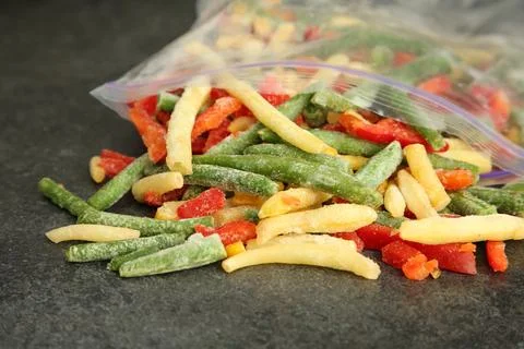 Zip bag with different frozen vegetables on grey table, closeup xkwx asparagus assortment background bag carrot closeup cold cooking cut delicious diet different eating food freeze freezer freezing fresh frost frozen grey health healthy homemade ice ingredient kitchen meal mix mixed natural nutrition object organic pepper product raw storage table tasty various vegan vegetable vegetables vegetarian vitamin zip