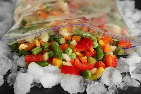 Zip bag with different frozen vegetables and ice on table, closeup xkwx asparagus assortment background bag carrot closeup cold cooking corn cut delicious diet different eating food freeze freezer freezing fresh frost frozen grey health healthy homemade ice ingredient kitchen meal mix mixed natural nutrition object organic peas pepper product raw storage table tasty various vegan vegetable vegetables vegetarian vitamin zip