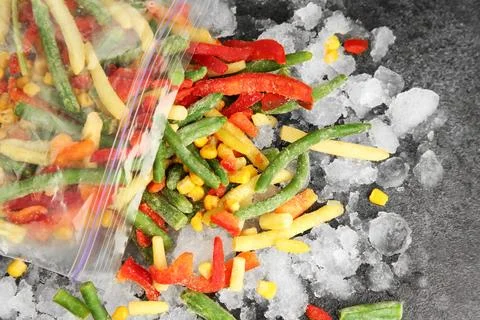 Zip bag with different frozen vegetables and ice on grey table, top view xkwx asparagus assortment background bag carrot cold cooking corn cut delicious diet different eating flat food freeze freezer freezing fresh frost frozen grey health healthy homemade ice ingredient kitchen lay meal mix mixed natural nutrition object organic pepper product raw storage table tasty top various vegan vegetables vegetarian view vitamin zip