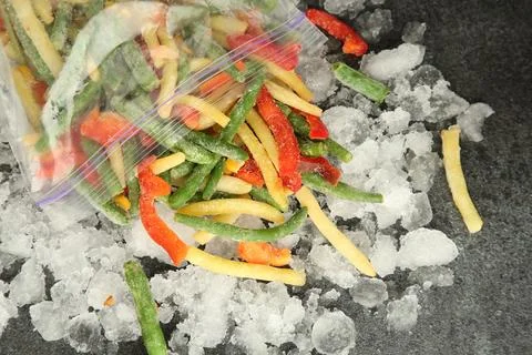 Zip bag with different frozen vegetables and ice on grey table, top view xkwx asparagus assortment background bag carrot cold cooking corn cut delicious diet different eating flat food freeze freezer freezing fresh frost frozen grey health healthy homemade ice ingredient kitchen lay meal mix mixed natural nutrition object organic pepper product raw storage table tasty top various vegan vegetables vegetarian view vitamin zip