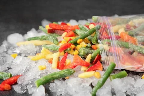 Zip bag with different frozen vegetables and ice on grey table, closeup xkwx asparagus assortment background bag carrot closeup cold cooking corn cut delicious diet different eating food freeze freezer freezing fresh frost frozen grey health healthy homemade ice ingredient kitchen meal mix mixed natural nutrition object organic pepper product raw storage table tasty various vegan vegetable vegetables vegetarian vitamin zip